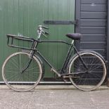 A vintage black painted trade bicycle,