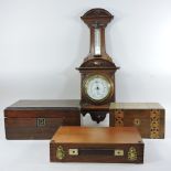 An early 20th century walnut cased aneroid barometer, 65cm tall,