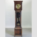 A 1920's oak cased longcase clock,
