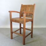 A teak umpire's chair,