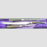A silver mounted carving set, with antler handles,
