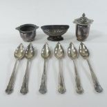 A set of early 20th century silver grapefruit spoons, cased,