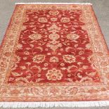 A Ziegler carpet, on red ground,