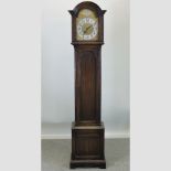 A 1930's oak cased long case clock,