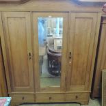 A 19th century pine armoire,