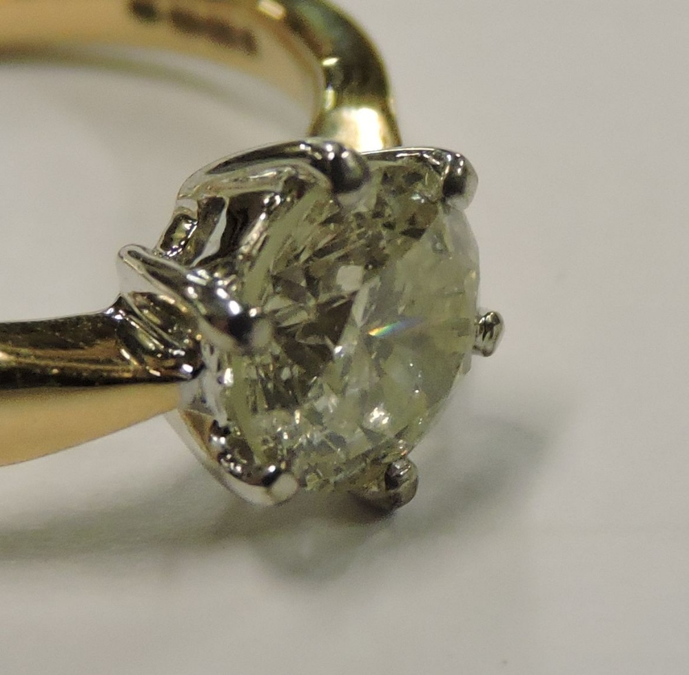 An 18 carat gold solitaire diamond ring, approximately one carat, - Image 3 of 7