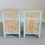 A pair of pine and blue painted side cabinets,