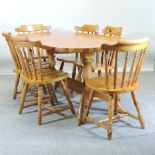 A pine twin pedestal dining table, 180 x 90cm,
