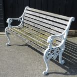A slatted wooden garden bench, with lion end supports,