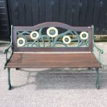 A green painted metal and slatted garden bench, with sunflower panel,