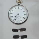 A silver pocket watch,