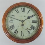 A Victorian oak cased dial clock,