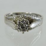 An 18 carat white gold and diamond ring,