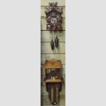 A cuckoo clock, 63cm tall,