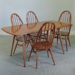 An Ercol dining table, 150 x 76cm,
