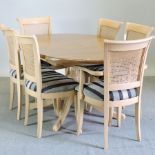 A modern pine extending dining table, 179 x 106cm,