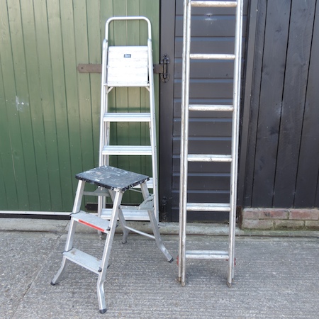 An extending aluminium ladder,