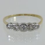 An 18 carat gold graduated five stone diamond ring