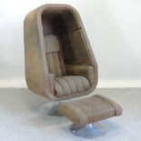 A 1960's brown upholstered egg chair,