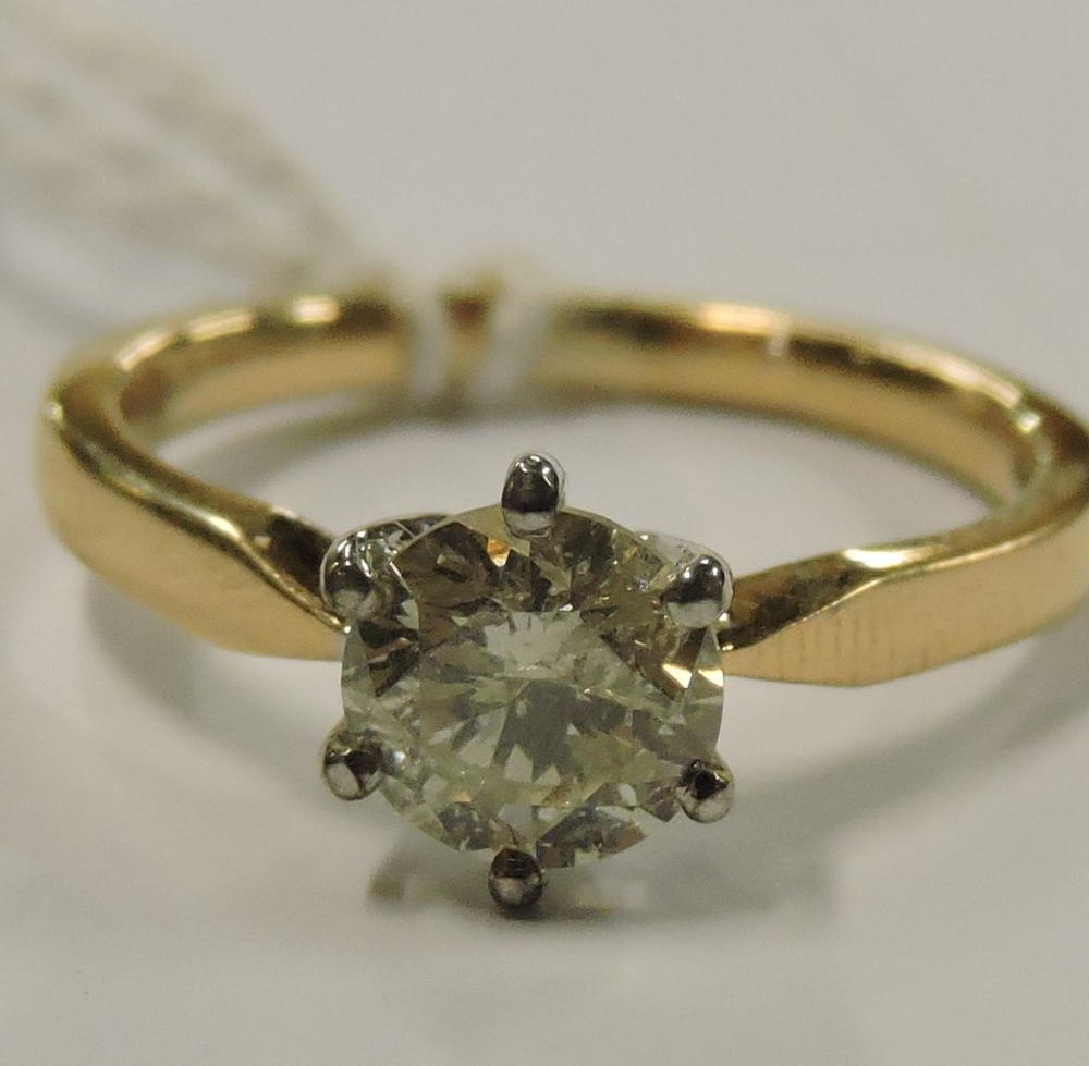 An 18 carat gold solitaire diamond ring, approximately one carat, - Image 4 of 7
