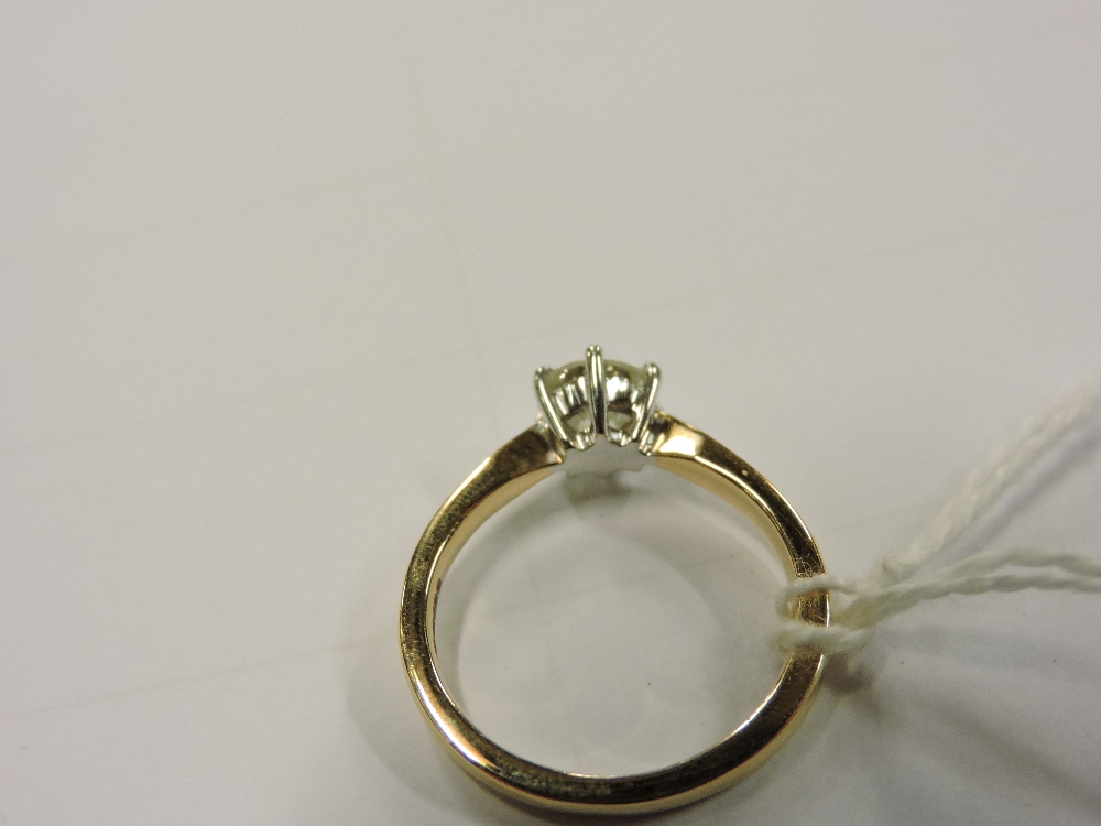 An 18 carat gold solitaire diamond ring, approximately one carat, - Image 6 of 7