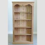 A modern pine standing open bookcase,