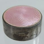 A silver and pink enamel pill box,