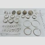 A collection of silver jewellery, to include lockets,