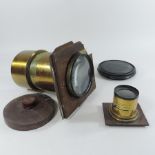 A brass telescopic lens, together with another by Ross,