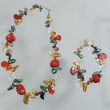 A coloured gemstone necklace,