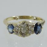 An 18 carat gold sapphire and diamond ring