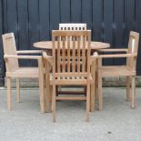 A teak circular garden table, 90cm diameter,