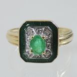 A 14 carat gold emerald,