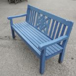 A blue painted garden bench,