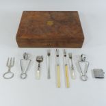 An early 20th century silver vesta, together with a small collection of plated cutlery,