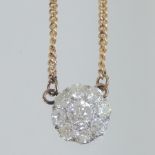 An 18 carat gold and diamond pendant cluster necklace, 1.