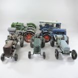 A collection of seven model tractors,