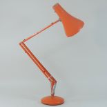 A 1960's Herbert Terry orange painted angle poise desk lamp