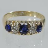 An 18 carat gold sapphire and diamond dress ring, Chester 1864,