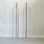 A pair of metal folding garden spires,