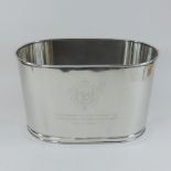 A plated wine cooler, engraved with crest and inscription,