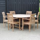 A teak circular garden table, 150cm diameter,