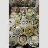 A collection of 19th century Pratt ware pot lids,