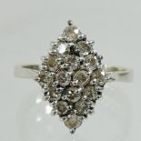 An 18 carat white gold diamond ring,