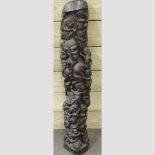 An African carved hardwood figure group,