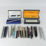 A collection of assorted pens,