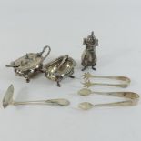 An early 20th century silver condiment set, to include salts, together with a silver pepper,