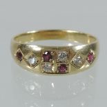 An 18 carat gold, ruby and diamond ring,