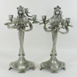 A pair of Art Nouveau style pewter figural candelabra,