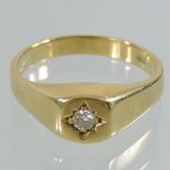 An 18 carat gold and diamond set single stone ring,